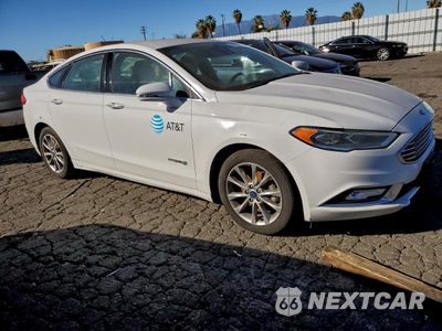 Czwarte zdjęcie samochodu z boku: 2017 FORD FUSION SE HYBRID VIN:3FA6P0LU2HR409283 - miniatura
