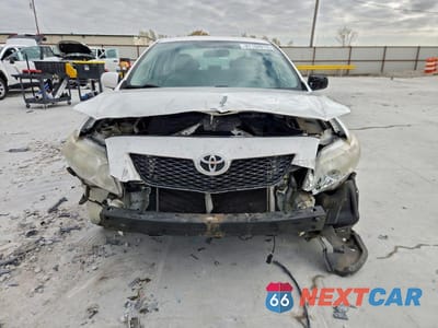 Piąte zdjęcie samochodu w środku: 2010 TOYOTA COROLLA BASE VIN:1NXBU4EEXAZ385209 - miniatura