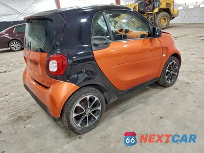 Trzecie zdjęcie samochodu z tyłu: 2016 SMART FORTWO VIN:WMEFJ5DA9GK080065 - miniatura