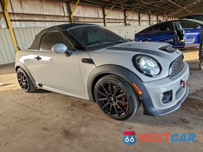 Czwarte zdjęcie samochodu z boku: 2012 MINI COOPER ROADSTER JOHN COOPER WORKS VIN:WMWSY5C51CT312625 - miniatura