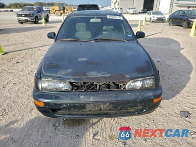 Piąte zdjęcie samochodu w środku: 1996 TOYOTA COROLLA DX VIN:1NXBB02E5TZ463496 - miniatura