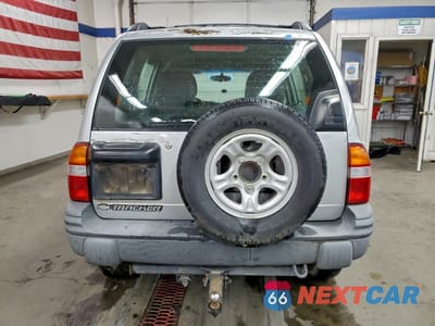 Zdjęcie 6 z 15 samochodu: 2001 CHEVROLET TRACKER VIN:2CNBJ13C016952812 - miniatura