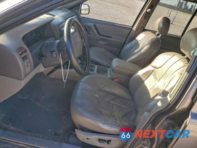 Zdjęcie 7 z 14 samochodu: 2000 JEEP GRAND CHEROKEE LAREDO VIN:1J4G248S0YC367975 - miniatura