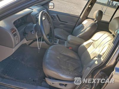 Zdjęcie 7 z 14 samochodu: 2000 JEEP GRAND CHEROKEE LAREDO VIN:1J4G248S0YC367975 - miniatura