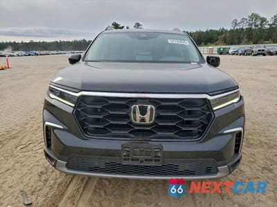Piąte zdjęcie samochodu w środku: 2024 HONDA PILOT TOURING VIN:5FNYG2H71RB009574 - miniatura