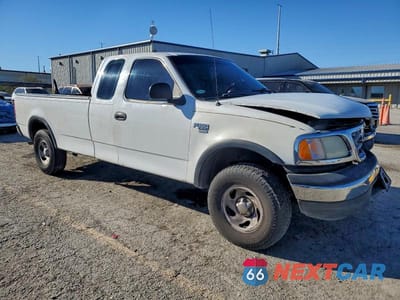 Czwarte zdjęcie samochodu z boku: 2000 FORD F150 VIN:1FTRX18W4YNB17399 - miniatura