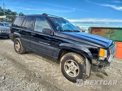 Czwarte zdjęcie samochodu z boku: 1997 JEEP GRAND CHEROKEE LAREDO VIN:1J4GZ58S6VC531856 - miniatura
