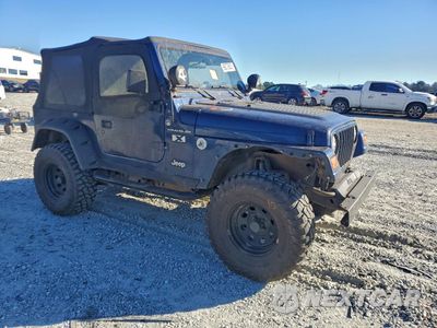 Czwarte zdjęcie samochodu z boku: 2002 JEEP WRANGLER / TJ X VIN:1J4FA39S32P775538 - miniatura