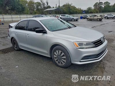 Czwarte zdjęcie samochodu z boku: 2016 VOLKSWAGEN JETTA S VIN:3VW267AJ5GM271292 - miniatura