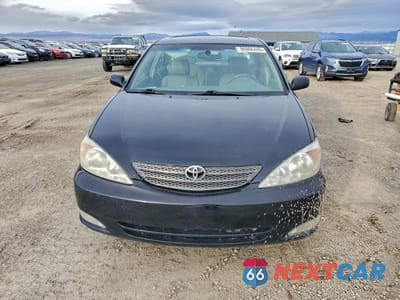 Piąte zdjęcie samochodu w środku: 2003 TOYOTA CAMRY XLE V6 VIN:JTDBF30K830094269 - miniatura