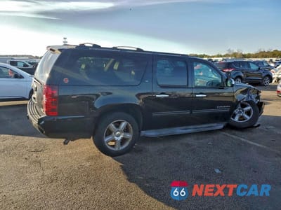 Trzecie zdjęcie samochodu z tyłu: 2012 CHEVROLET SUBURBAN K1500 LT VIN:1GNSKJE73CR326705 - miniatura
