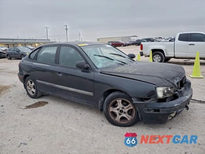 Czwarte zdjęcie samochodu z boku: 2002 HYUNDAI ELANTRA GLS VIN:KMHDN55D92U057946 - miniatura