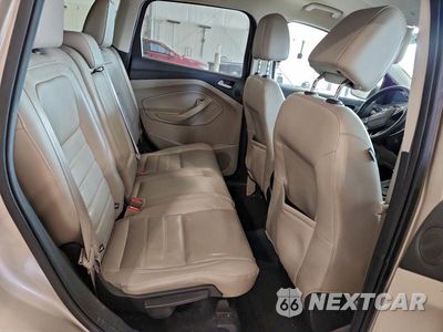 Zdjęcie 11 z 12 samochodu: 2017 FORD ESCAPE TITANIUM VIN:1FMCU9J94HUC50005 - miniatura