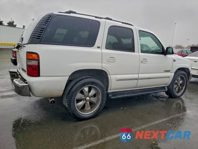 Trzecie zdjęcie samochodu z tyłu: 2012 CHEVROLET TAHOE C1500 VIN:1GNEC13Z92R235094 - miniatura