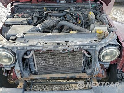 Zdjęcie 12 z 13 samochodu: 2008 JEEP WRANGLER UNLIMITED SAHARA VIN:1J4GA59148L623467 - miniatura