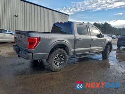 Trzecie zdjęcie samochodu z tyłu: 2023 FORD F150 SUPERCREW VIN:1FTFW1E53PFB57015 - miniatura