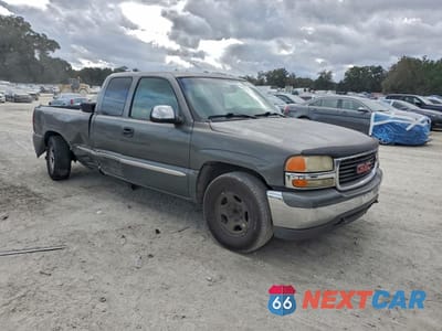 Czwarte zdjęcie samochodu z boku: 2002 GMC NEW SIERRA C1500 VIN:2GTEC19V321275337 - miniatura
