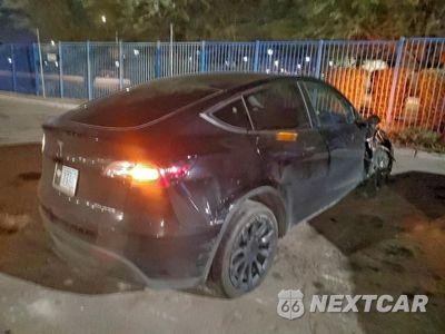 Trzecie zdjęcie samochodu z tyłu: 2022 TESLA MODEL Y VIN:7SAYGDEE1NF341879 - miniatura