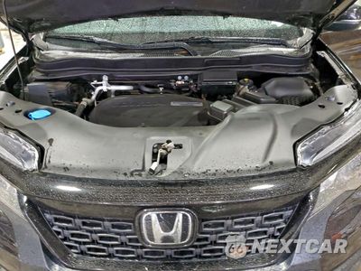 Zdjęcie 12 z 16 samochodu: 2020 HONDA PASSPORT EXL VIN:5FNYF8H52LB010101 - miniatura