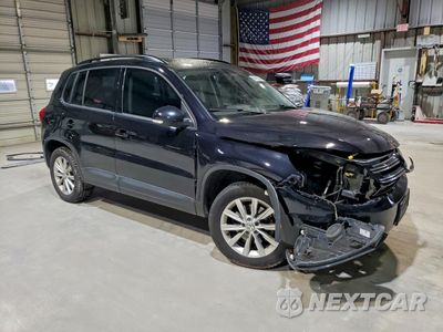 Czwarte zdjęcie samochodu z boku: 2017 VOLKSWAGEN TIGUAN S VIN:WVGBV7AX9HK044640 - miniatura