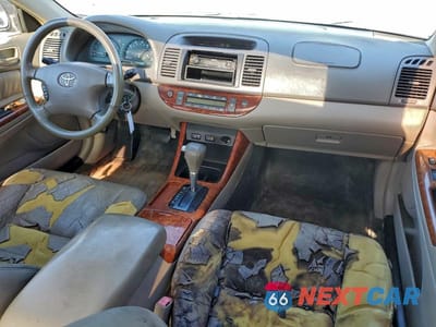 Zdjęcie 8 z 11 samochodu: 2002 TOYOTA CAMRY LE VIN:JTDBF30K720044946 - miniatura