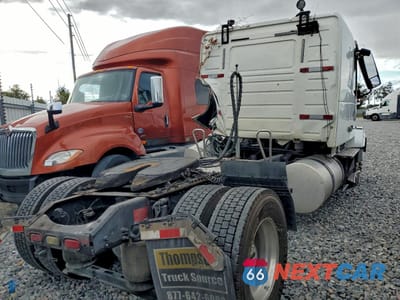 Czwarte zdjęcie samochodu z boku: 2014 VOLVO VN VNL VIN:4V4N19TH2EN152398 - miniatura