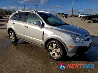 Czwarte zdjęcie samochodu z boku: 2014 CHEVROLET CAPTIVA LS VIN:3GNAL2EK9ES570233 - miniatura