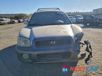 Piąte zdjęcie samochodu w środku: 2002 HYUNDAI SANTA FE GLS VIN:KM8SC13D22U143687 - miniatura