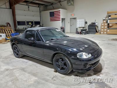 Czwarte zdjęcie samochodu z boku: 1999 MAZDA MX-5 MIATA VIN:JM1NB3532X0102933 - miniatura