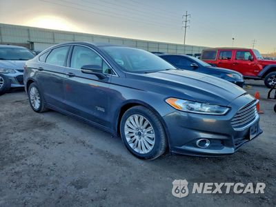Czwarte zdjęcie samochodu z boku: 2016 FORD FUSION SE PHEV VIN:3FA6P0PU5GR216263 - miniatura