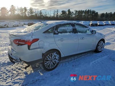 Trzecie zdjęcie samochodu z tyłu: 2018 FORD FOCUS TITANIUM VIN:1FADP3J25JL294757 - miniatura