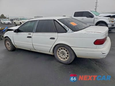 Drugie zdjęcie samochodu z przodu: 1992 FORD TAURUS LX VIN:1FALP5342NG231135 - miniatura