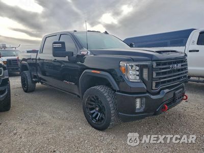 Czwarte zdjęcie samochodu z boku: 2020 GMC SIERRA K3500 AT4 VIN:1GT49VEY2LF181820 - miniatura