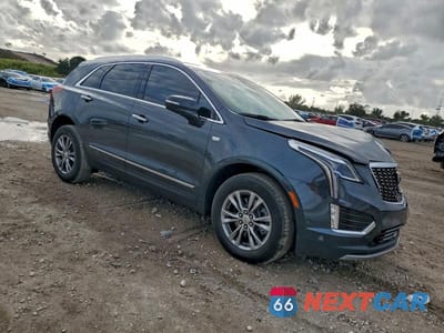 Czwarte zdjęcie samochodu z boku: 2022 CADILLAC XT5 PREMIUM LUXURY VIN:1GYKNCRS4NZ131364 - miniatura