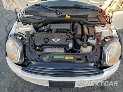 Zdjęcie 11 z 11 samochodu: 2009 MINI COOPER VIN:WMWMF335X9TW76019 - miniatura