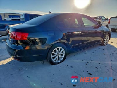 Trzecie zdjęcie samochodu z tyłu: 2012 VOLKSWAGEN JETTA SE VIN:3VWDX7AJXCM411238 - miniatura