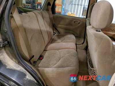 Zdjęcie 11 z 13 samochodu: 2004 MAZDA TRIBUTE LX VIN:4F2YZ94154KM08990 - miniatura