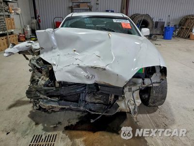 Piąte zdjęcie samochodu w środku: 2006 HYUNDAI TIBURON GT VIN:KMHHN65F26U230821 - miniatura