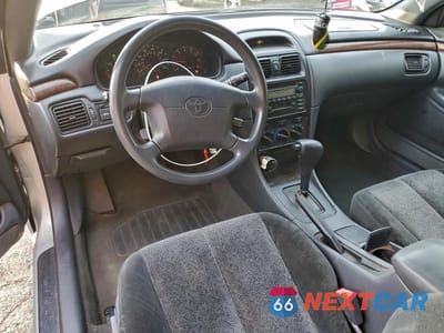 Zdjęcie 8 z 12 samochodu: 2000 TOYOTA CAMRY SOLARA VIN:2T1CG22P4YC388012 - miniatura