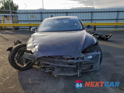 Piąte zdjęcie samochodu w środku: 2014 TESLA MODEL S VIN:5YJSA1S10EFP55756 - miniatura