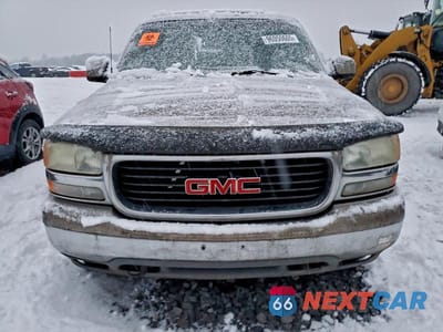Piąte zdjęcie samochodu w środku: 2001 GMC YUKON XL K1500 VIN:3GKFK16T71G109195 - miniatura