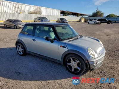 Czwarte zdjęcie samochodu z boku: 2003 MINI COOPER VIN:WMWRC33423TE19873 - miniatura