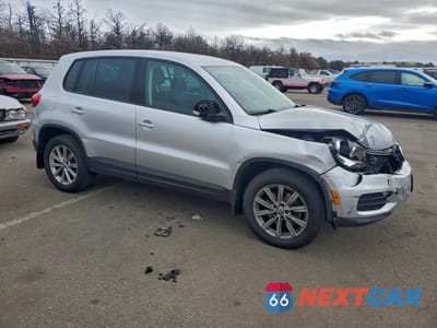 Czwarte zdjęcie samochodu z boku: 2014 VOLKSWAGEN TIGUAN S VIN:WVGBV3AX8EW550215 - miniatura