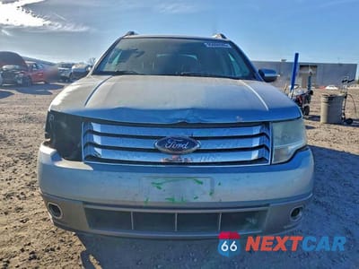 Piąte zdjęcie samochodu w środku: 2008 FORD TAURUS X SEL VIN:1FMDK02WX8GA27833 - miniatura