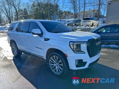 Czwarte zdjęcie samochodu z boku: 2021 GMC YUKON DENALI VIN:1GKS1DKT2MR375429 - miniatura