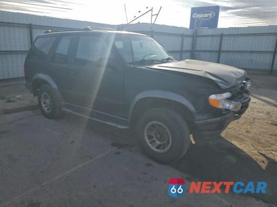 Czwarte zdjęcie samochodu z boku: 1998 FORD EXPLORER VIN:1FMYU22E8WUB33145 - miniatura