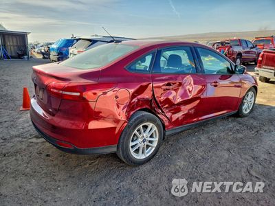 Trzecie zdjęcie samochodu z tyłu: 2017 FORD FOCUS SE VIN:1FADP3F2XHL210791 - miniatura