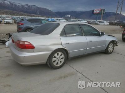 Trzecie zdjęcie samochodu z tyłu: 1999 HONDA ACCORD LX VIN:1HGCG5543XA140440 - miniatura