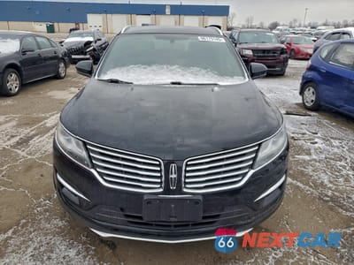Piąte zdjęcie samochodu w środku: 2018 LINCOLN MKC PREMIERE VIN:5LMCJ1D94JUL01303 - miniatura