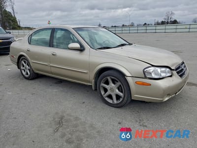 Czwarte zdjęcie samochodu z boku: 2001 NISSAN MAXIMA GXE VIN:JN1CA31AX1T112147 - miniatura